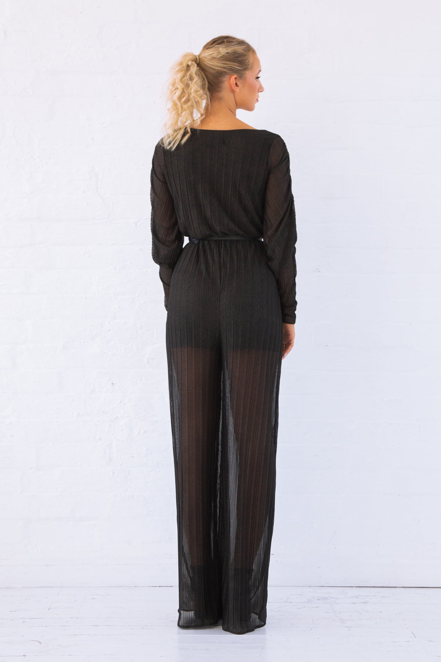 Black and gold long sleeve jumpsuit